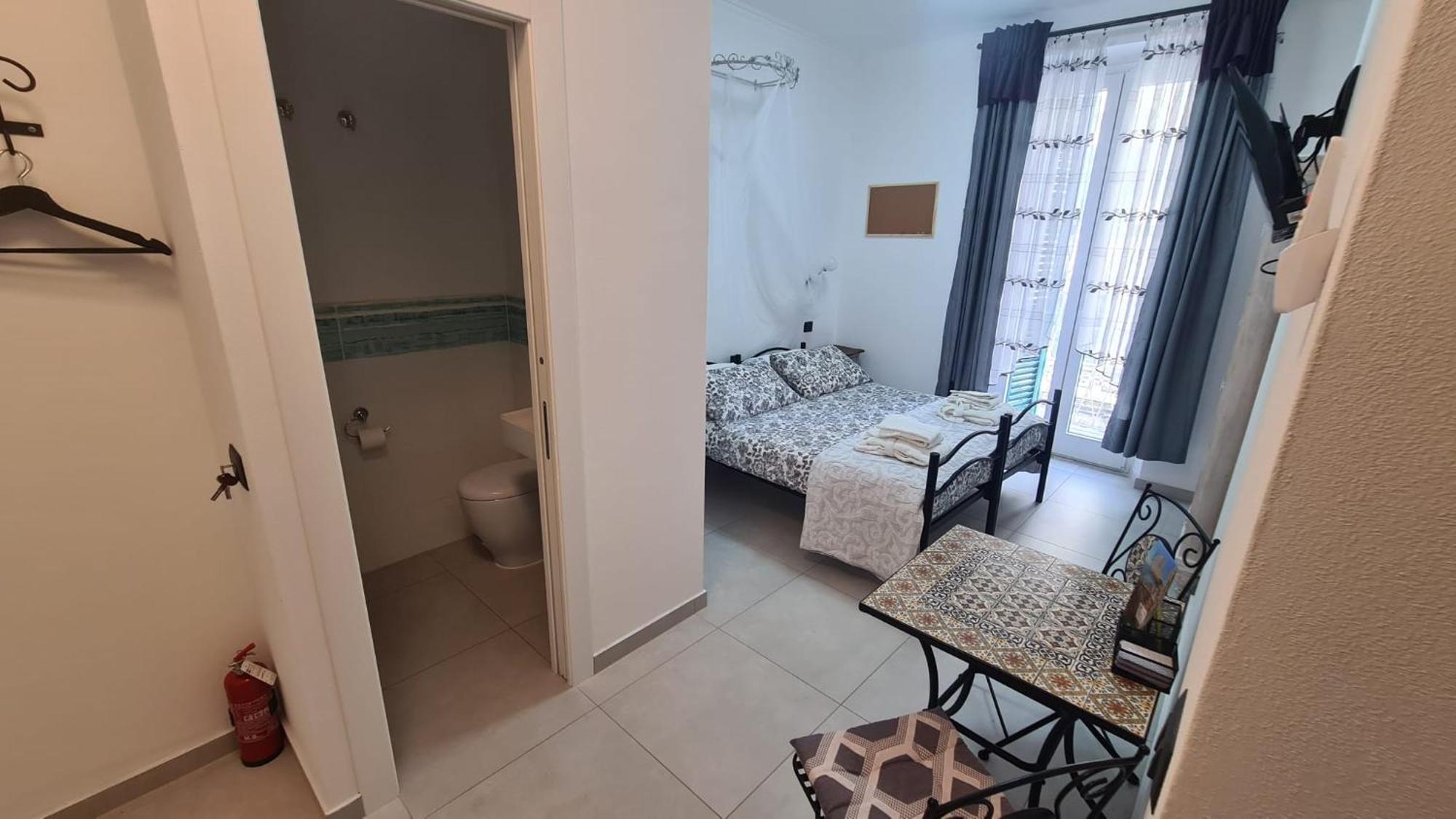 Hotel Amici Holidey Camera Stazione La Spezia Habitación foto